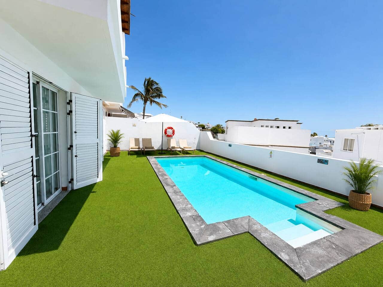 Heated pool at Villa Tabaiba Puerto del Carmen, holiday villa in Lanzarote