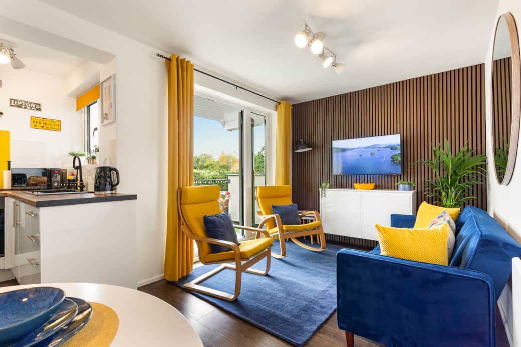 Open plan apartment with lounge, dinning area and kitchen that leads out to the balcony Open plan apartment with lounge, dinning area and kitchen that leads out to the balcony