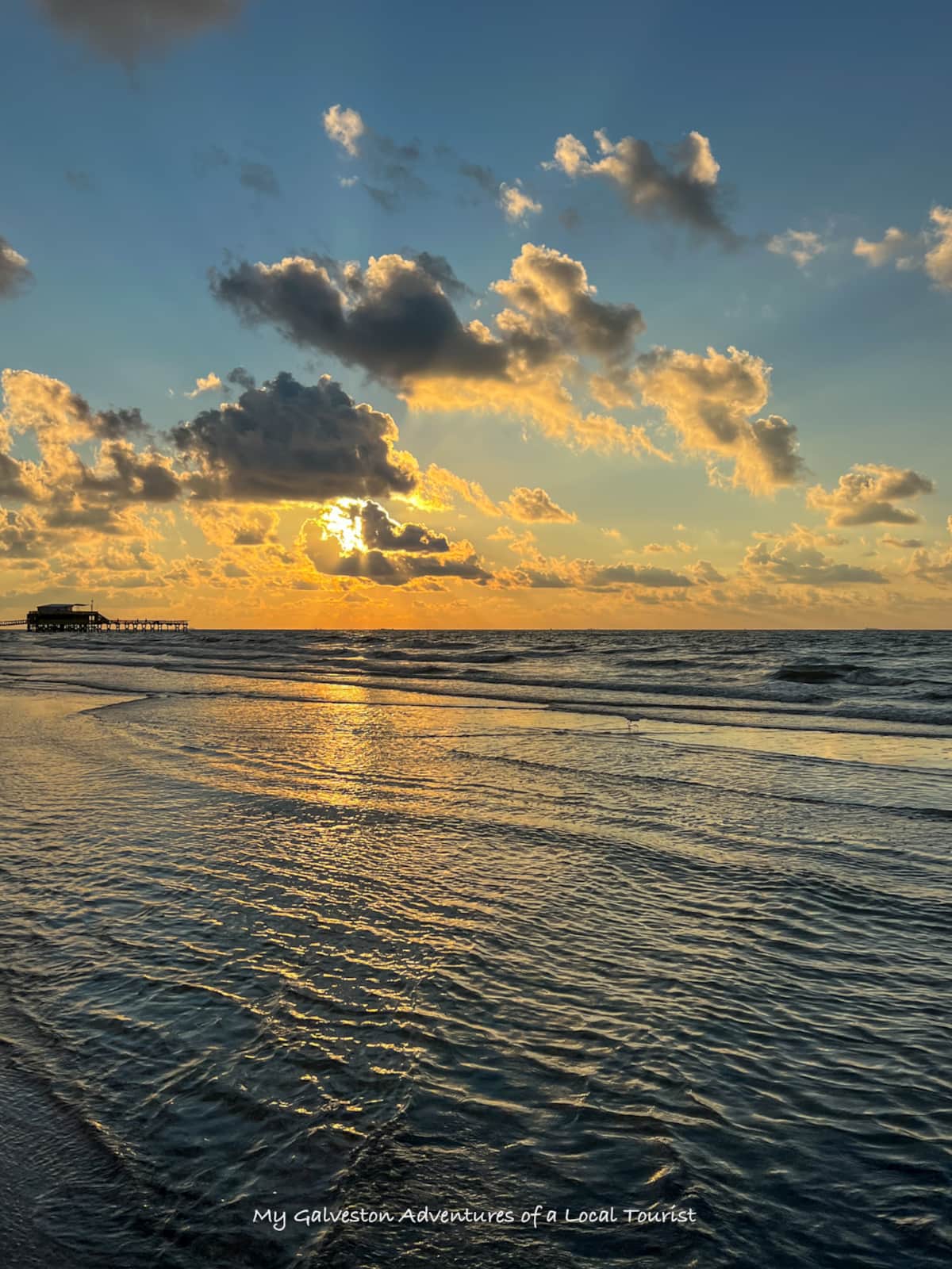 Sunset glow along the Galveston Seawall near White Magnolia