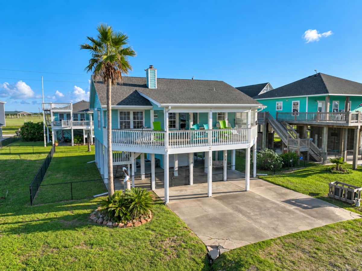 SeaHorsin Around vacation home with elevated living and a fenced yard