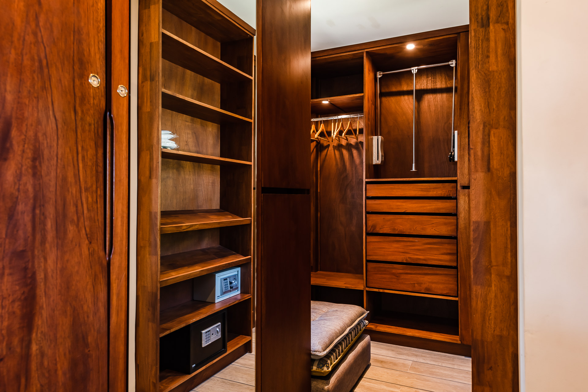 Custom walnut walk-in closet.