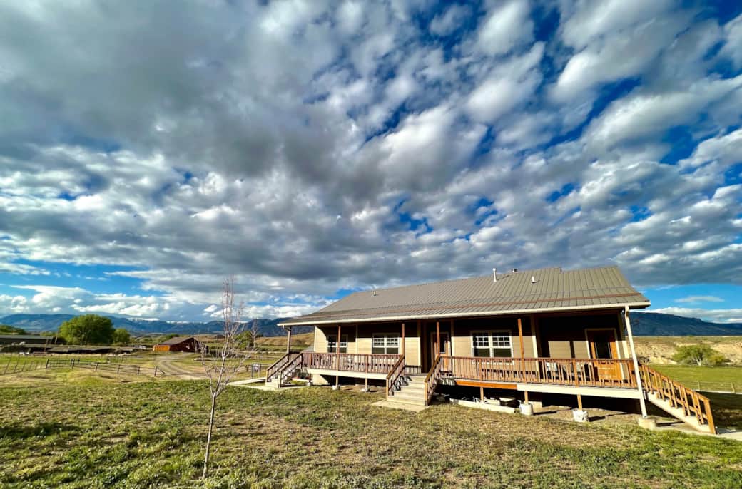 With 360 degree views, a full length back deck in addition to the huge front porch was needed!