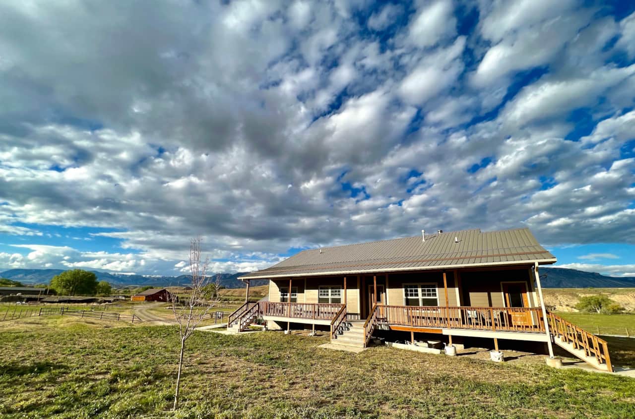 With 360 degree views, a full length back deck in addition to the huge front porch was needed!