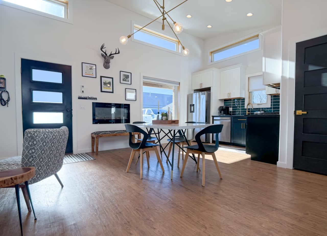 Sun-drenched open layout featuring sleek modern design—your stylish home base for a Sheridan getaway
