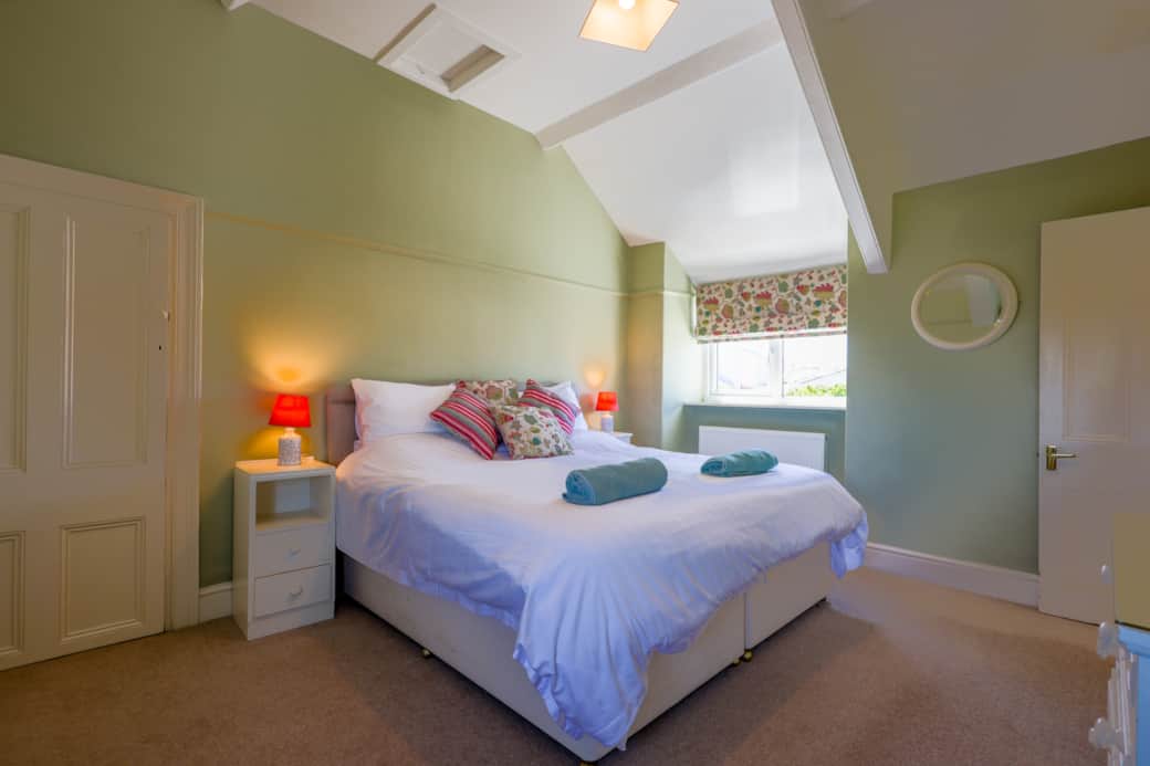 Bedroom 1 with bed made up as a Superking bed