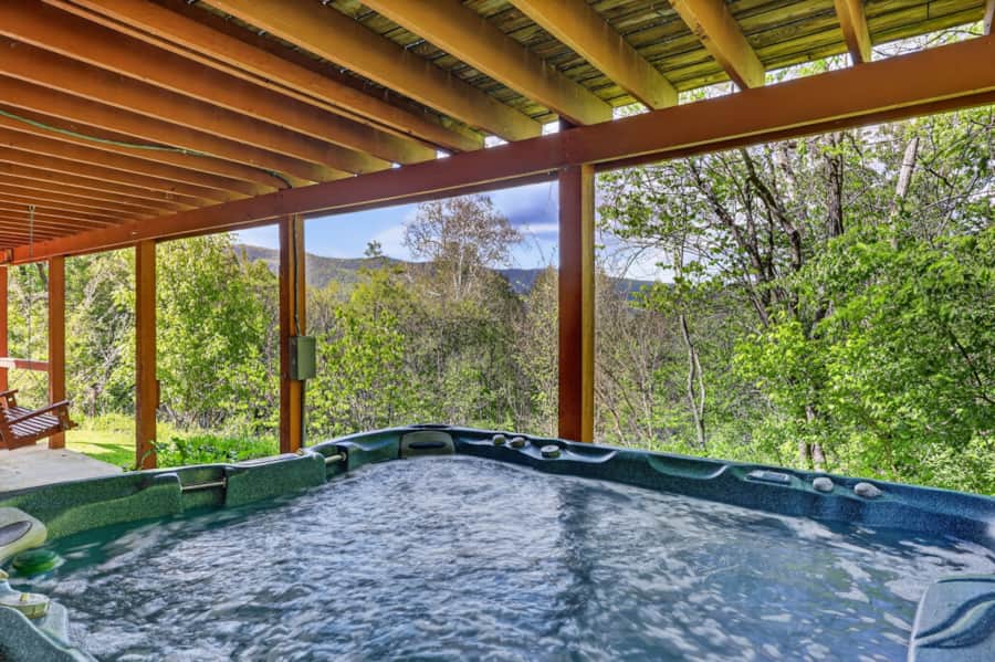 Covered hot tub with views