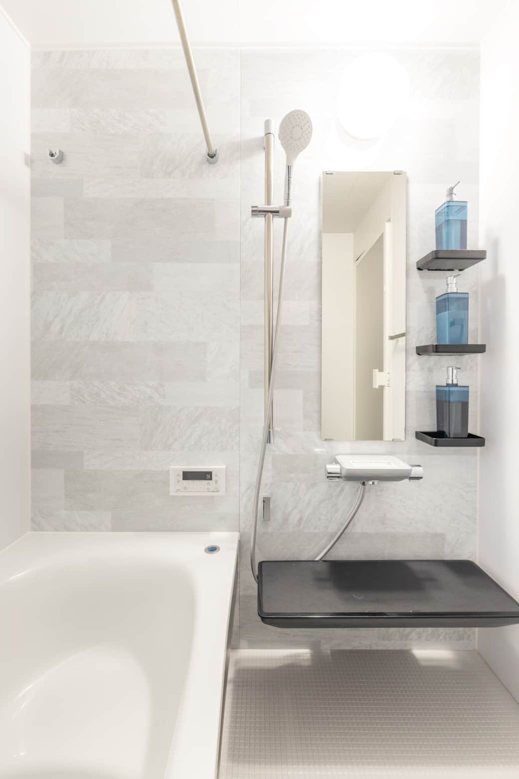 Minimalist shower bench tile mirror