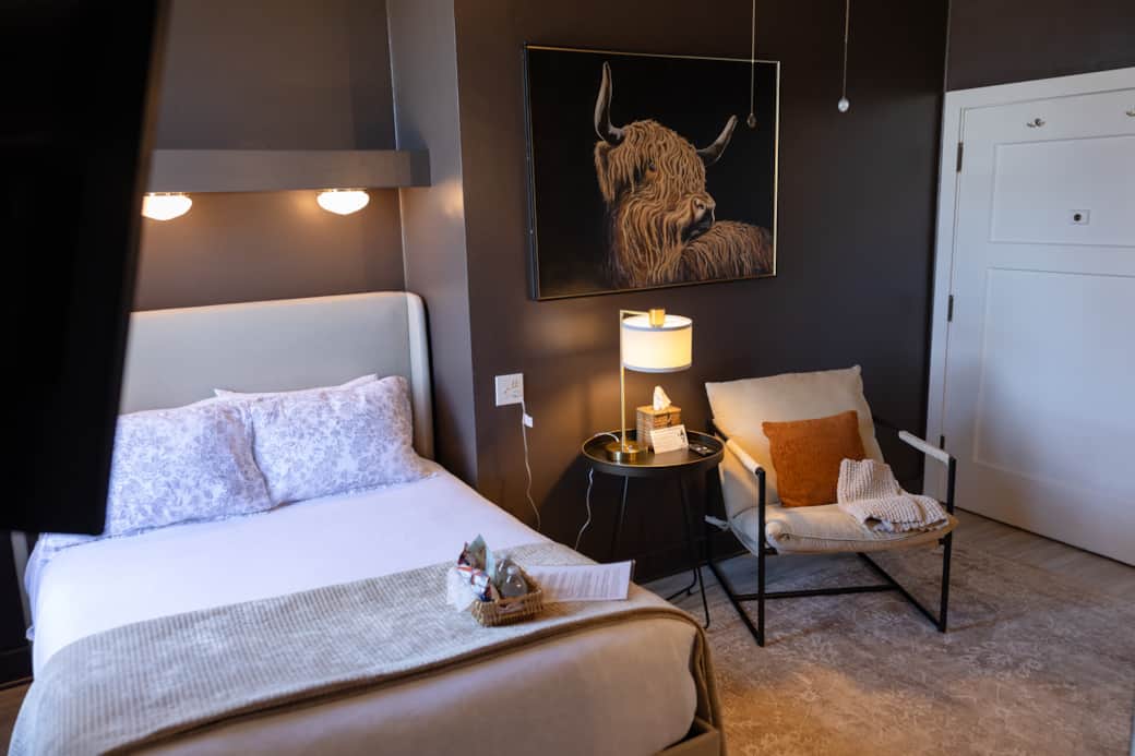 Full Sized Bed and Seating Area