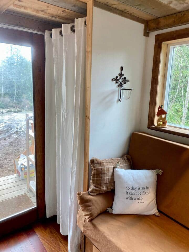 Entrance with bathroom behind the curtain. Entrance with bathroom behind the curtain.