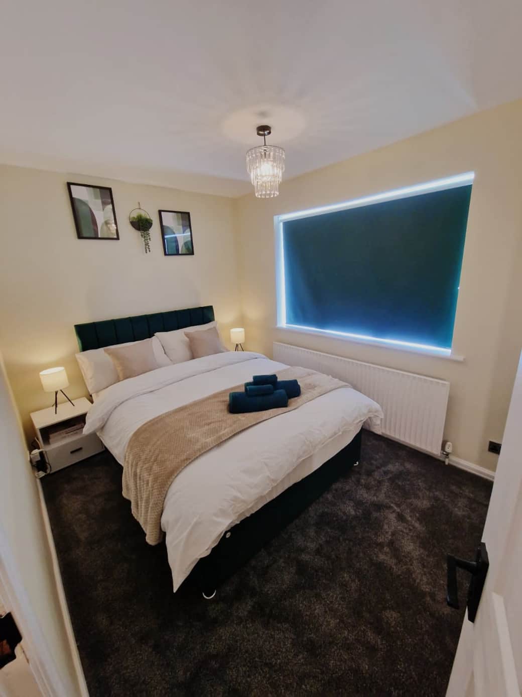 Spacious double bedroom with cosy bedding and elegant, contemporary décor.