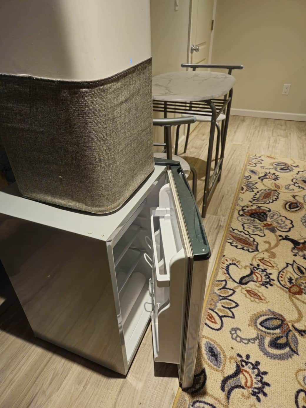 Mini fridge with complimentary water and air purifier