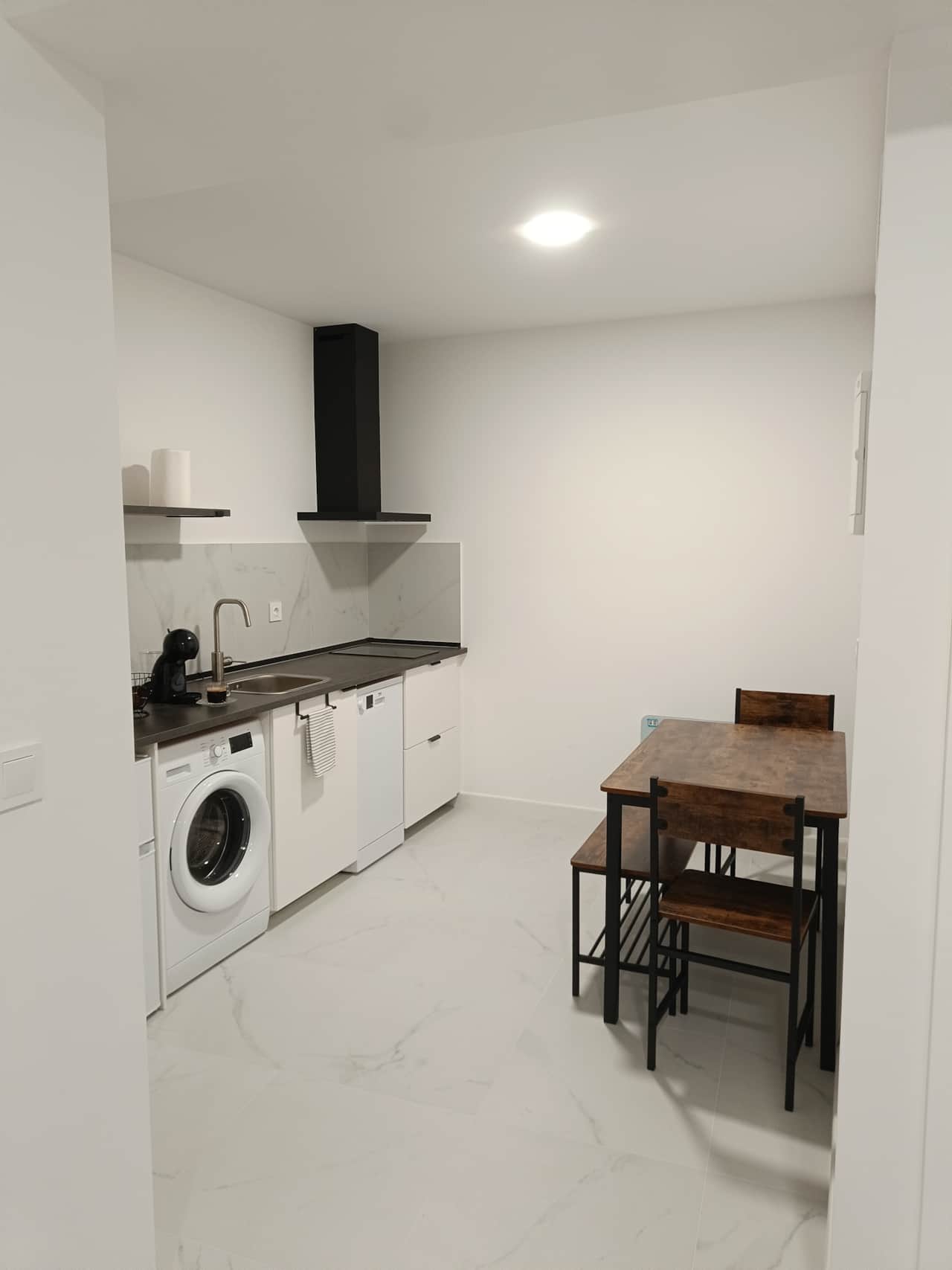 Cocina funcional con comedor integrado