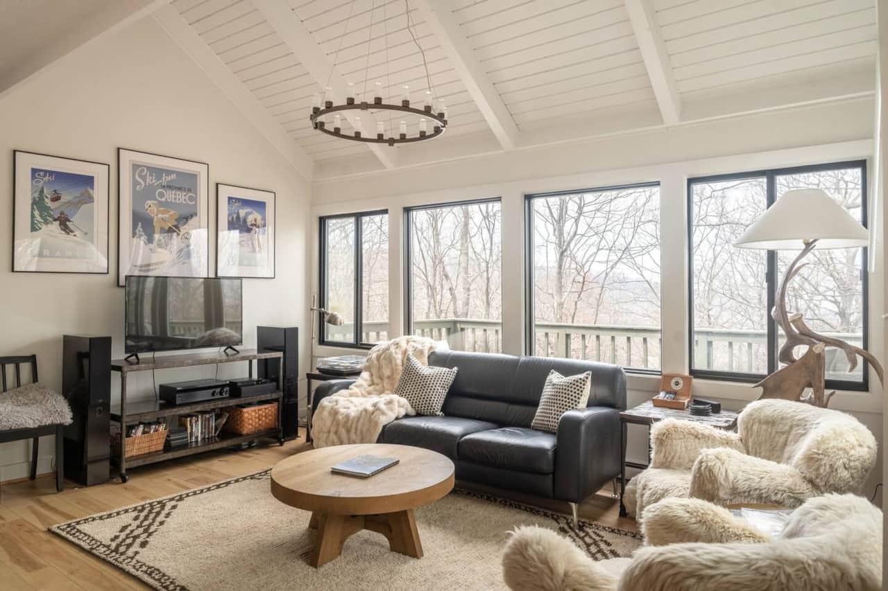 Welcome to our Boho Cliff House where spaces are drenched in warm natural light and seasonal views frame the mountains beyond!