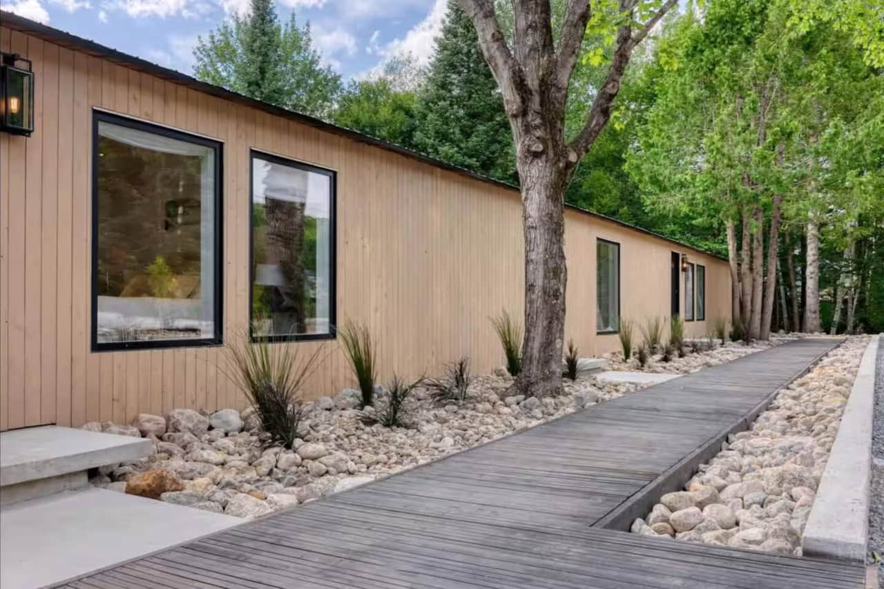 Modern Scandinavian-inspired architecture blending perfectly with the natural landscape