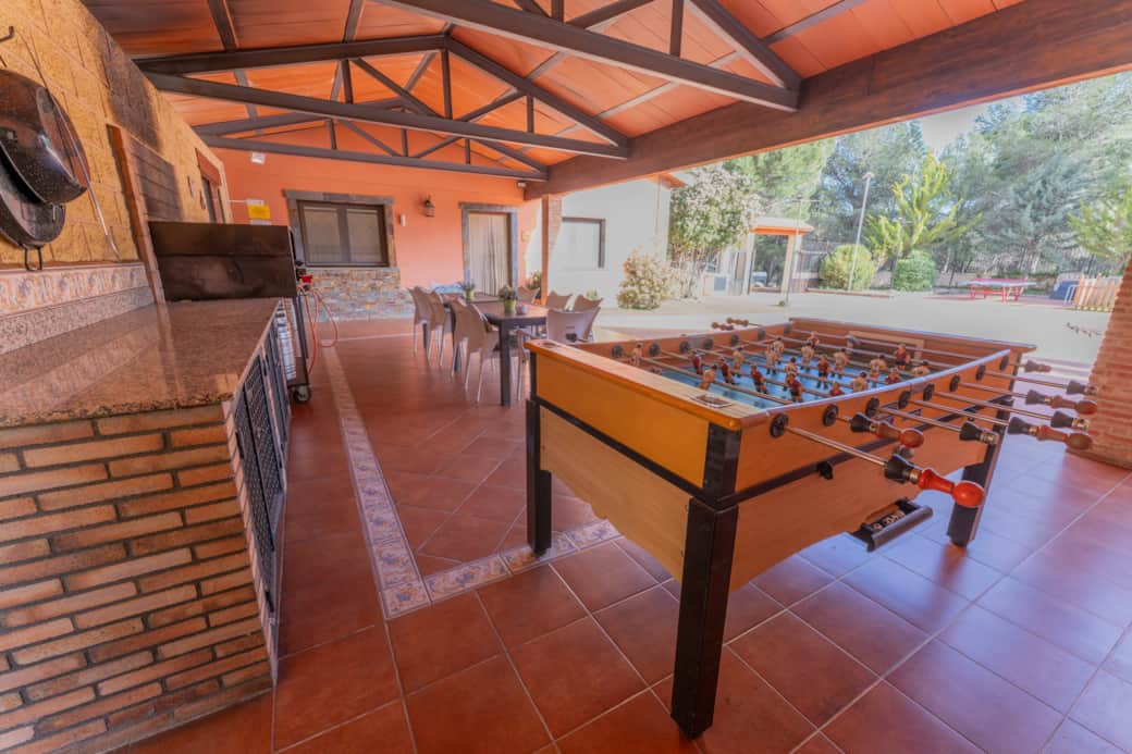 Porche exterior con Barbacoa y Futbolin