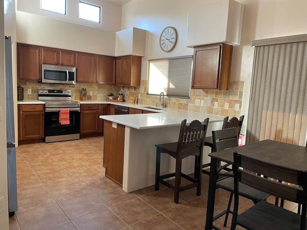 Kitchen and dinette area. Dinette seats 4. Bar seats 2. Kitchen and dinette area. Dinette seats 4. Bar seats 2.