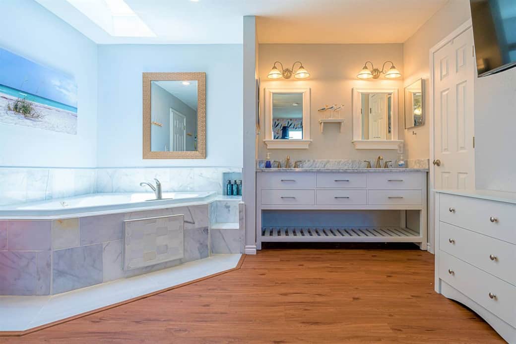 Enjoy our unique in-room Jacuzzi suite with private balcony.  Toilet and shower room available behind the door to the right.