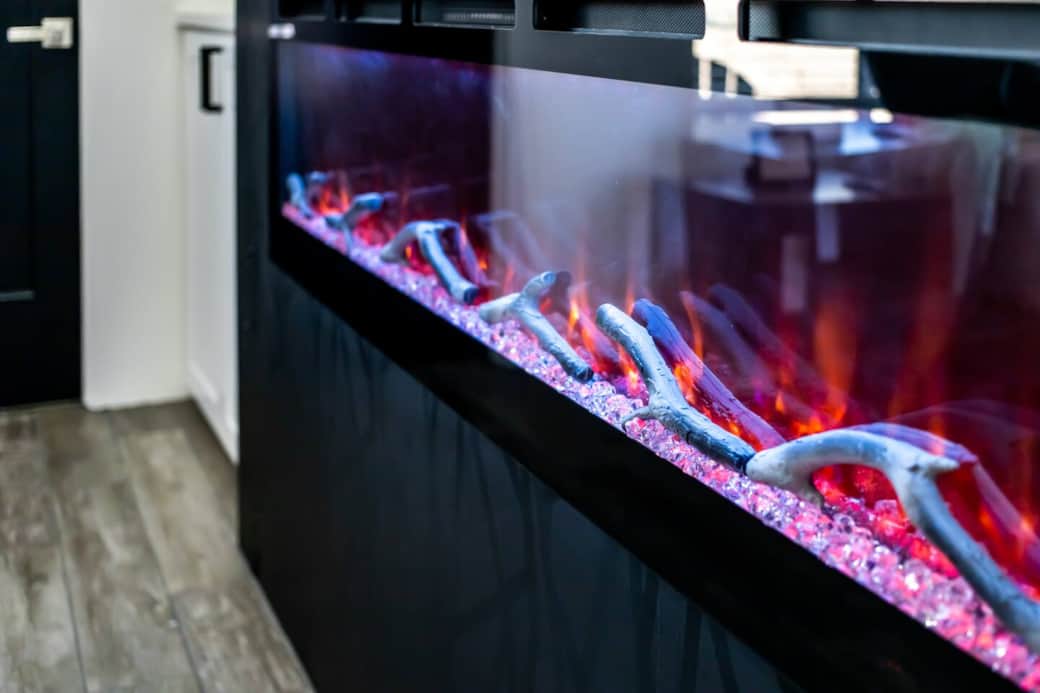 Ambiance with the flip of a switch with electric fireplace.