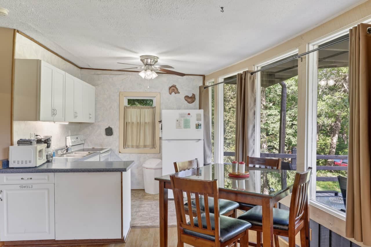 Fully equipped kitchen and dining room provide the perfect spot for morning coffee