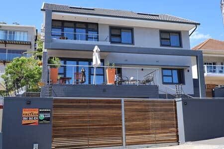 Front view, garage parking for 2 cars plus 1 additional parking inside the gate