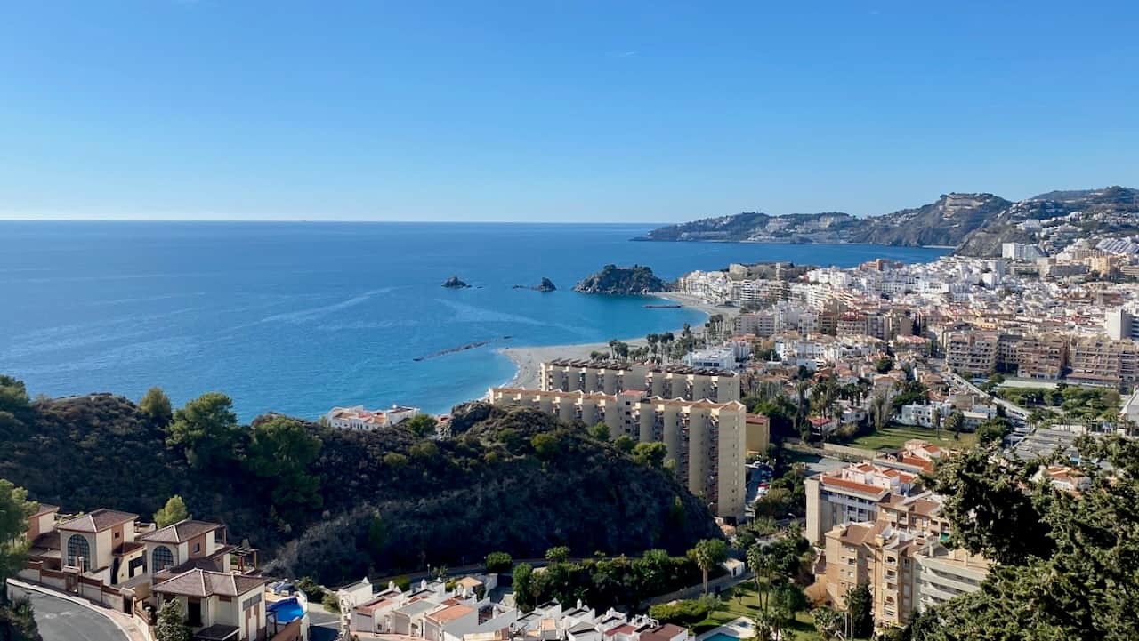 Scenic panoramic view of Almuñécar town with sea, hills, and whitewashed houses, Costa Tropical Andalusia