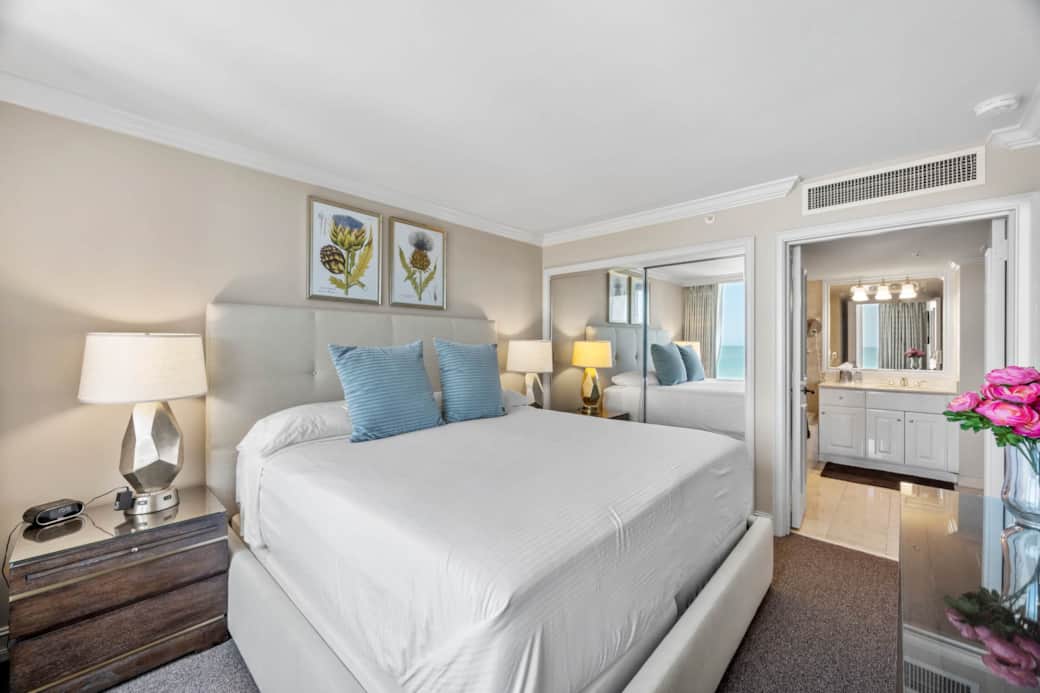 Master bedroom with king bed, cable television, and ocean view