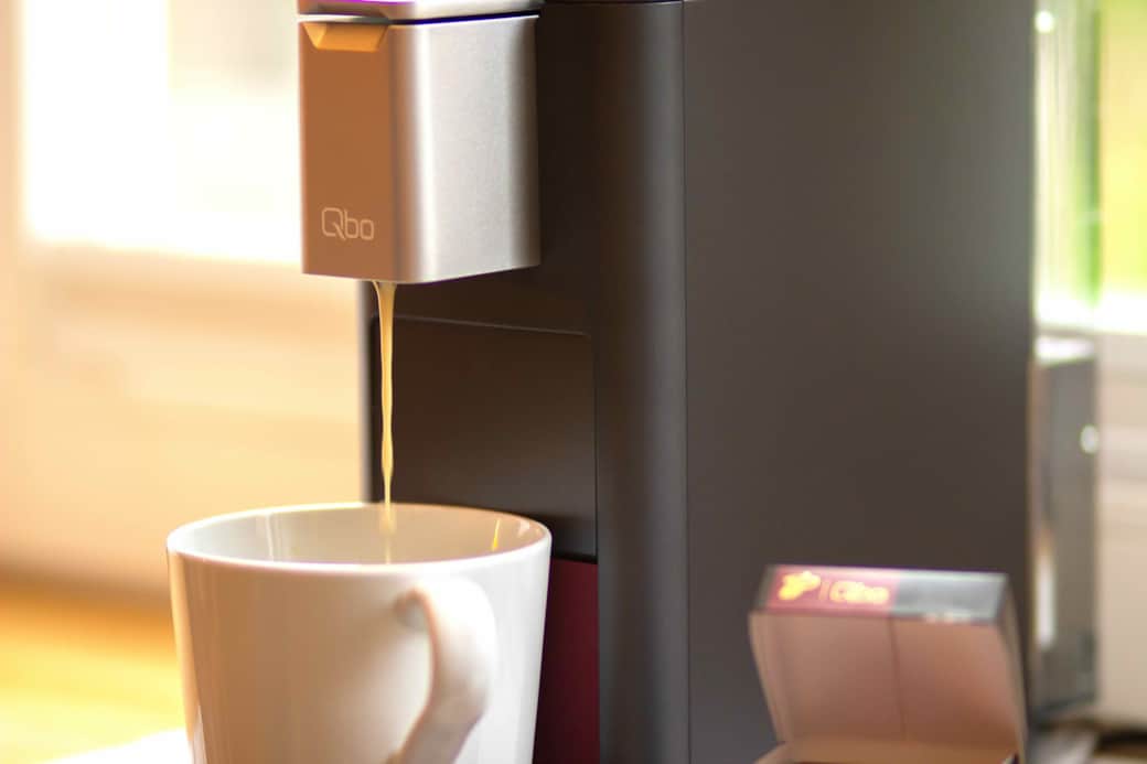 Espresso machine with capsules for coffee enjoyment