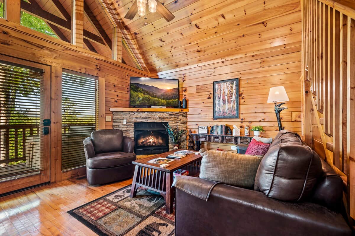 Cozy log cabin living room with fireplace