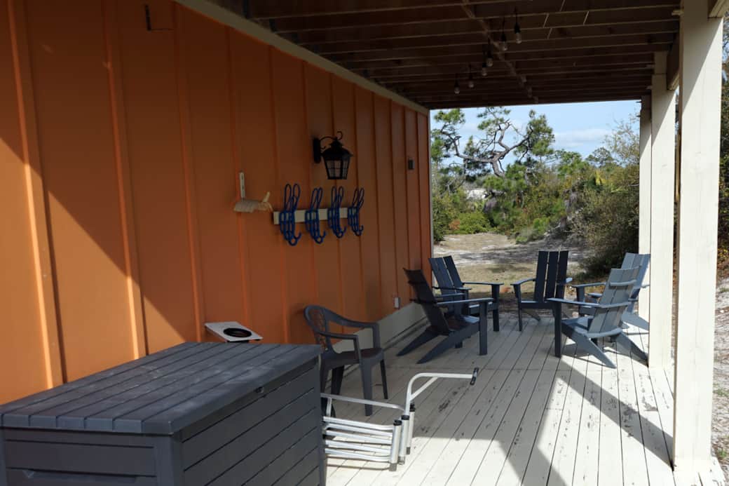 Bottom Deck w/ Adirondack Chairs, Beach Cart & Gear, and Outdoor Shower 