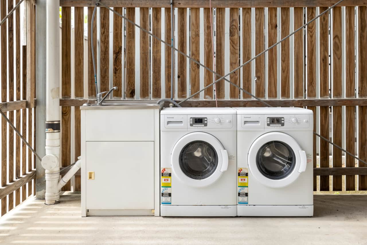 Shared Laundry Area: Washer available for convenient laundry needs 