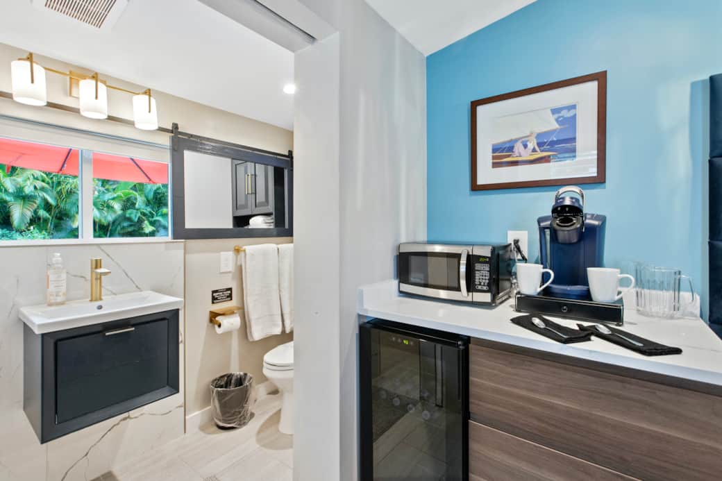 Poolside Hideaway coffee station and partial bathroom view. Poolside Hideaway coffee station and partial bathroom view.