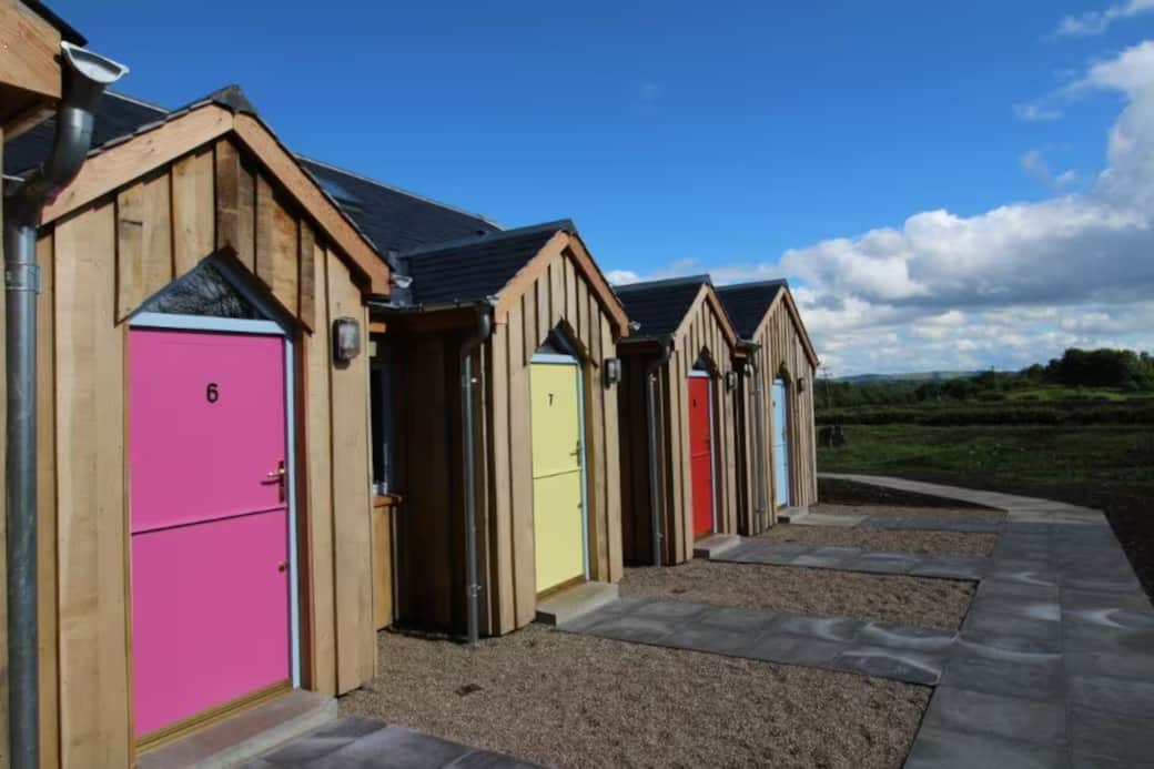 The Potting Sheds with path leading from car park area
