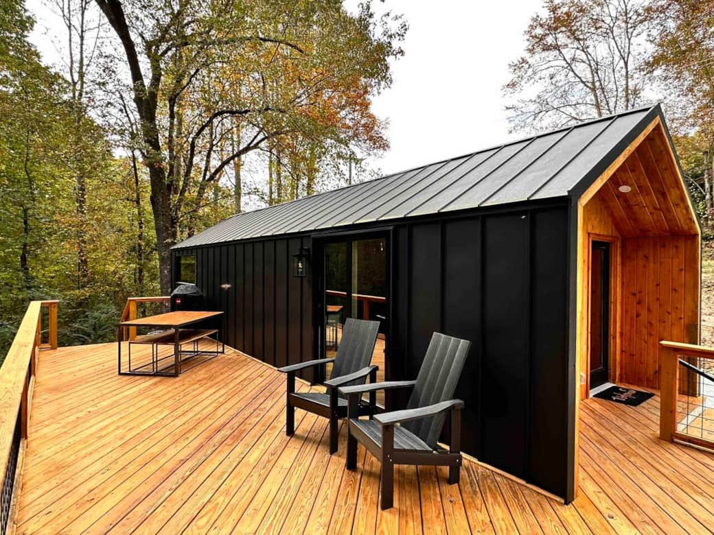 Modern Scandinavian cabin with expansive deck — your peaceful Brevard retreat just 5 minutes from downtown.