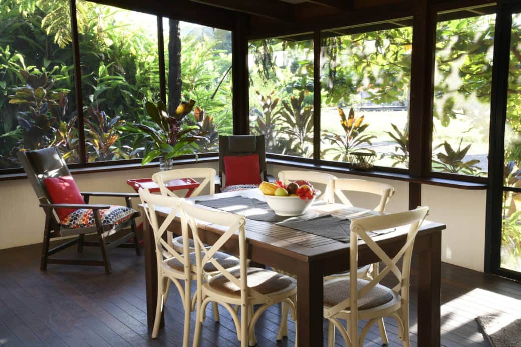 Lillypads Red Cottage - Veranda dining. Also great spot to catch up on your reading or just gaze out to the gardens and ponder.
