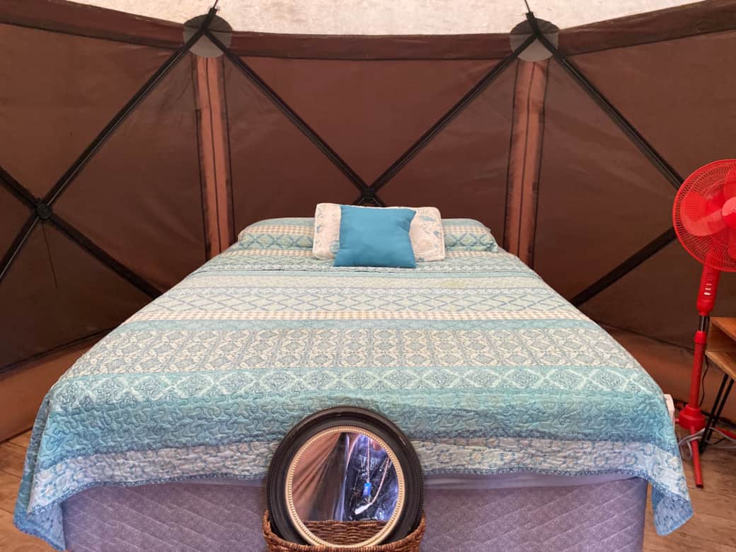 The Breathing Room Minimalist  Yurt with a platform queen airbed with fresh linens and towels. Perfect for solo travelers