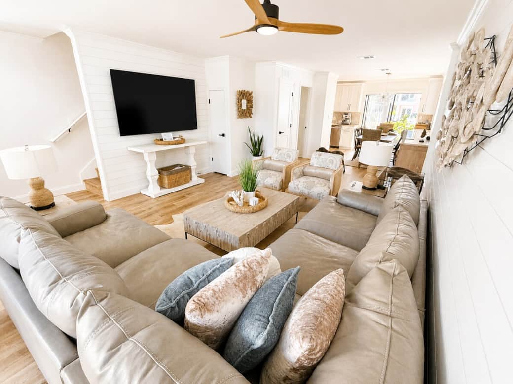 Sink into the large deep seated italian leather sectional and enjoy movie night on the 75-inch Smart TV.