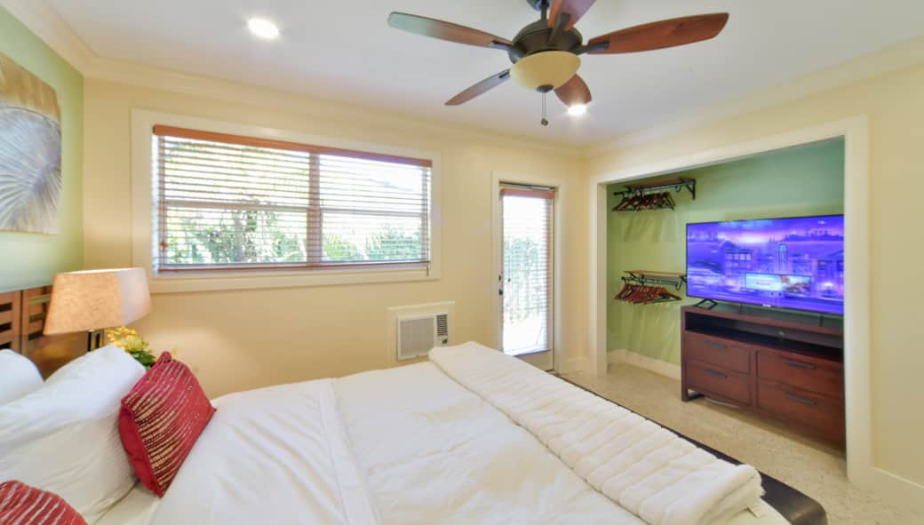 Suite #2 - Queen Bedroom with TV and Door to Terrace Suite #2 - Queen Bedroom with TV and Door to Terrace
