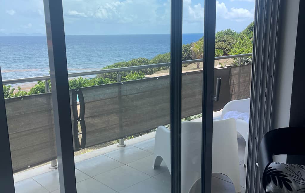 Ocean View from Sliders to large & spacious balcony overlooks infinity pool & See St Barth's