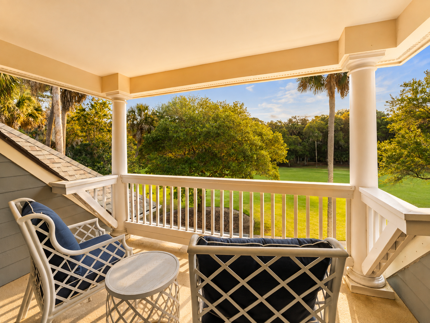 Sit back with a coffee and take in the open green stretching past the trees.