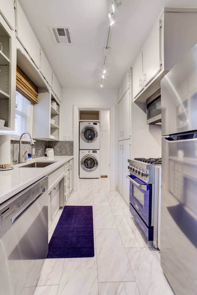 Moving from the dining room, the galley kitchen sits just off of the mudroom (which is how we enter and exit...the home).
We have stocked the kitchen with the basics and hope you will feel right at home should you choose to cook. Moving from the dining room, the galley kitchen sits just off of the mudroom (which is how we enter and exit...the home).
We have stocked the kitchen with the basics and hope you will feel right at home should you choose to cook.