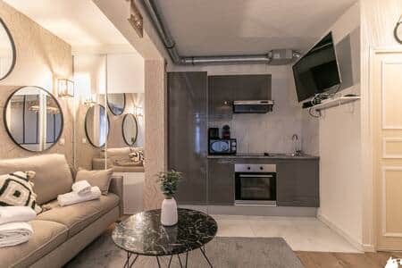 Salon avec cuisine équipée Salon avec cuisine équipée