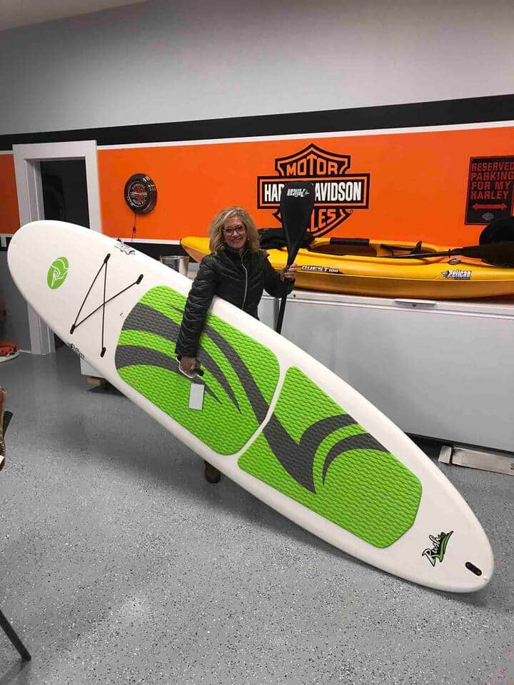 Stand up paddle board available when not in use .