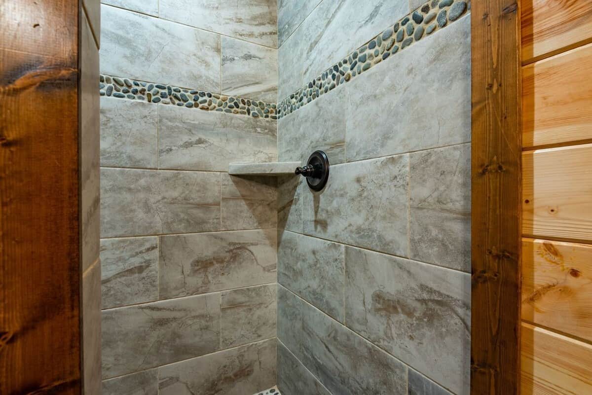 First ensuite bathroom featuring large walk in shower