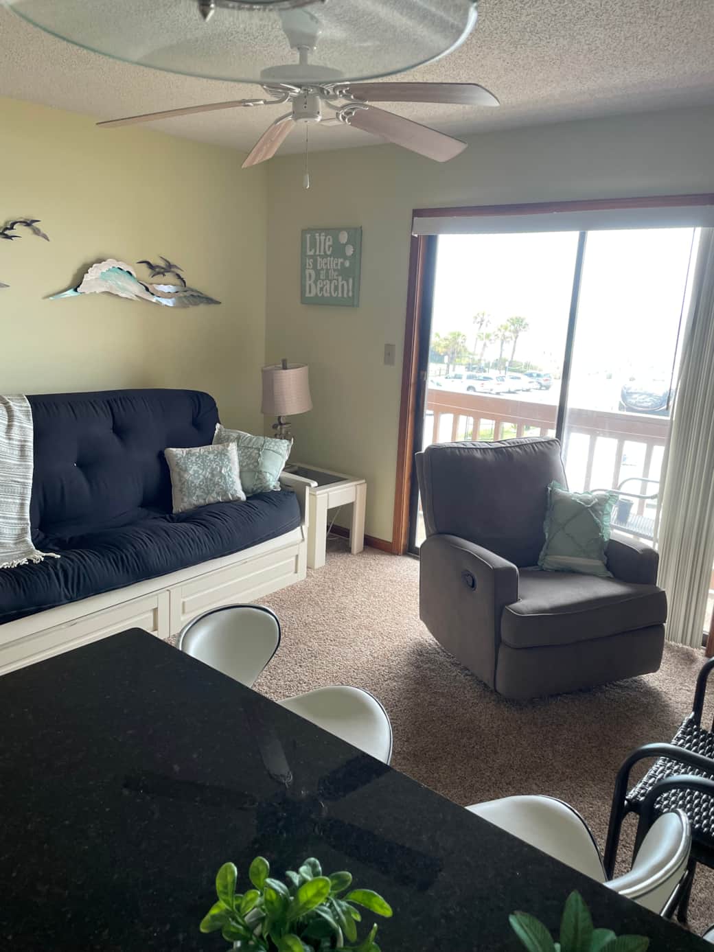 Living room has a double stuffed futon, couch, full-size Living room has a double stuffed futon, couch, full-size