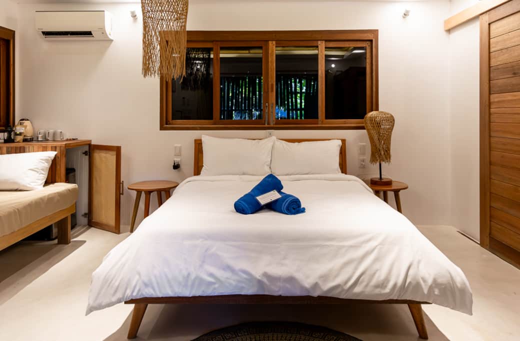 A comfy desk, a cozy queen bed, and a single bed for extra comfort or for additional family member. A comfy desk, a cozy queen bed, and a single bed for extra comfort or for additional family member.