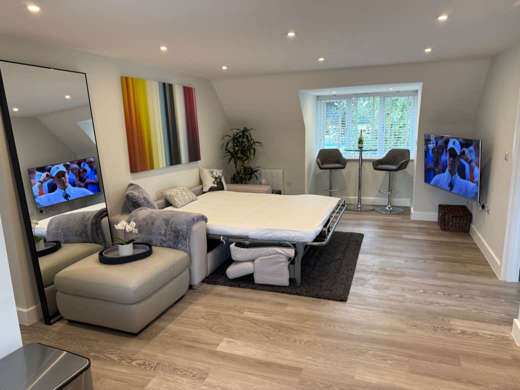 Living area with luxurious sofabed Living area with luxurious sofabed