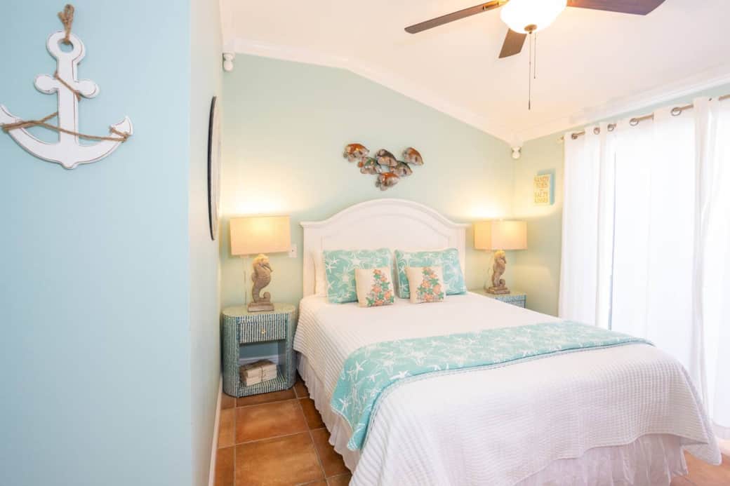 Coastal-chic queen room—dreamy memory-foam sleep, fresh linens, plush fluffy towels.