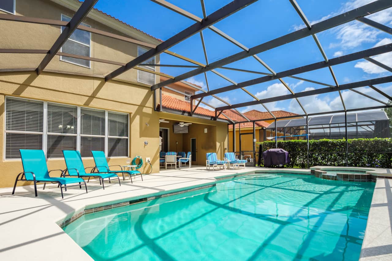 The external area is fully screened and has a safety fence for children around the pool