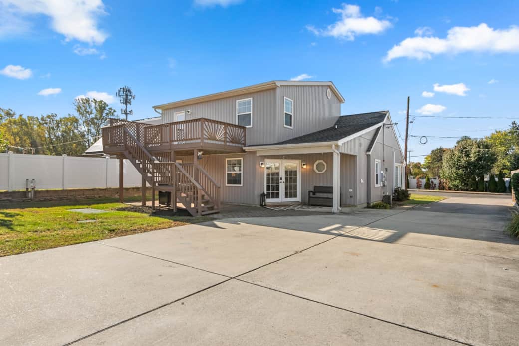 Large driveway and yard