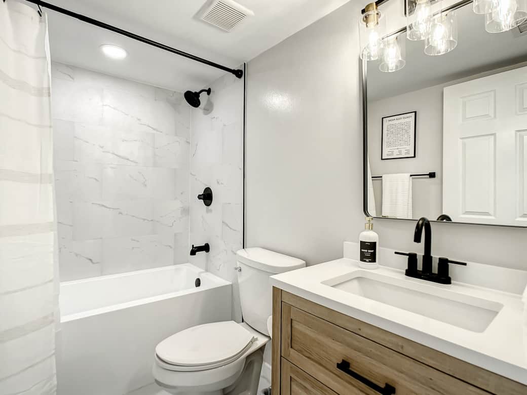 Hall bathroom featuring a relaxing soaking bathtub at Gulf Coast 107